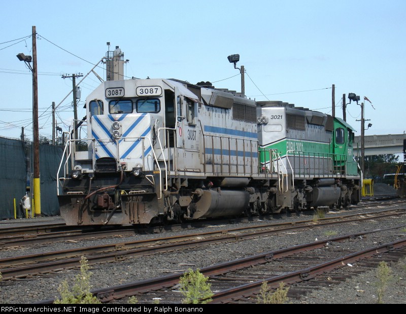 A pair of lease units rests between assignments at  the Oak Island enginehiouse